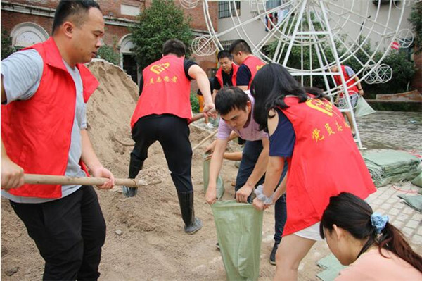 黨建引領(lǐng)戰(zhàn)洪峰--市古鎮(zhèn)投資公司全員行動確保安全度汛